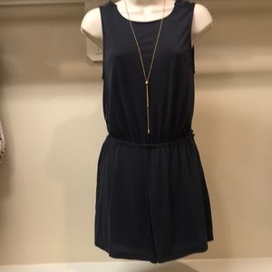 Urban Outfitters cross open back romper sz S